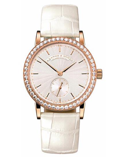 The 18k rose gold fake watches have white leather straps.